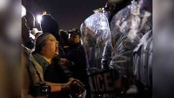 Shots fired in peaceful Ferguson gathering after car hits protester