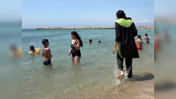 French court suspends burkini ban, says individual liberty can be restricted if it's a 'proven risk'