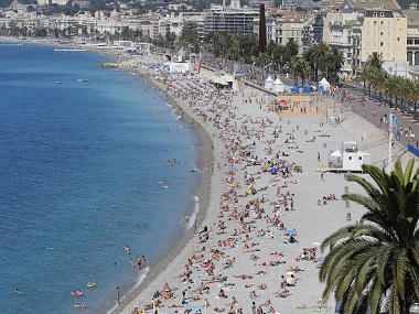 Corsica becomes third French city to ban burqini after beach clashes Corsica becomes third French city to ban burqini after beach clashes