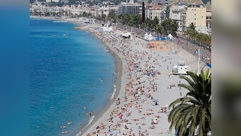 Corsica becomes third French city to ban burqini after beach clashes