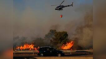 Wildfires in Southern France and Portugal force evacuation of more than 1,000 people