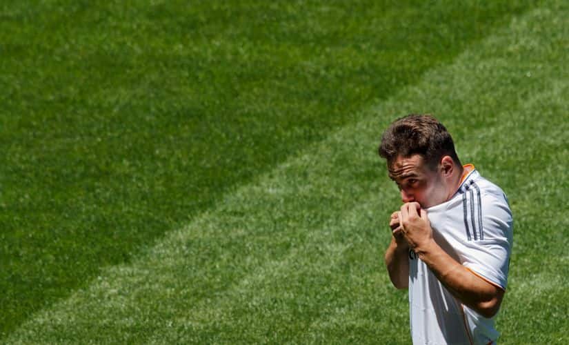 Daniel Carvajal kisses the Real Madrid shield on his shirt during his presentation in 2013. Getty