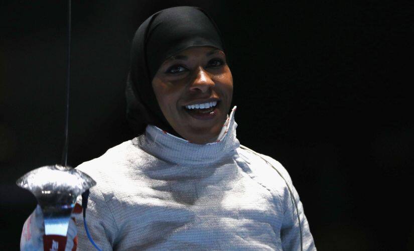 Ibtihaj Muhammad of the United States celebrates victory over Olena Kravatska. Getty