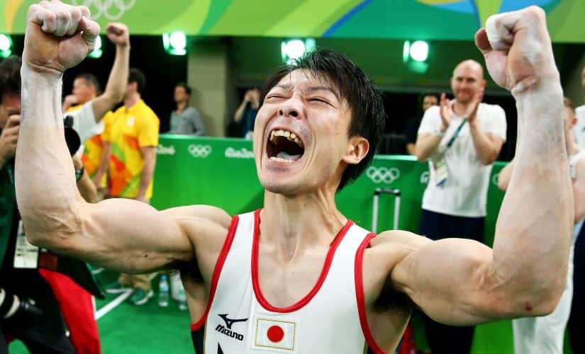 Kohei Uchimura celebrates winning the gold medal. Getty