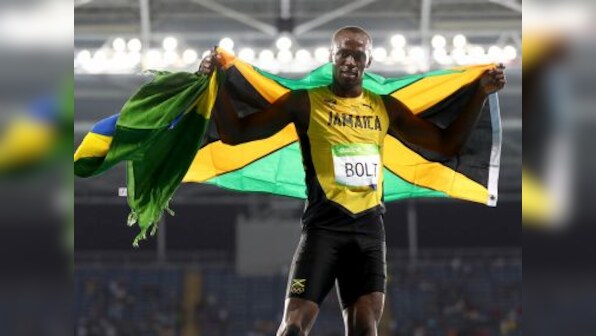Rio Olympics 2016: Usain Bolt keeps hopes alive for 'triple triple' after third 200m gold