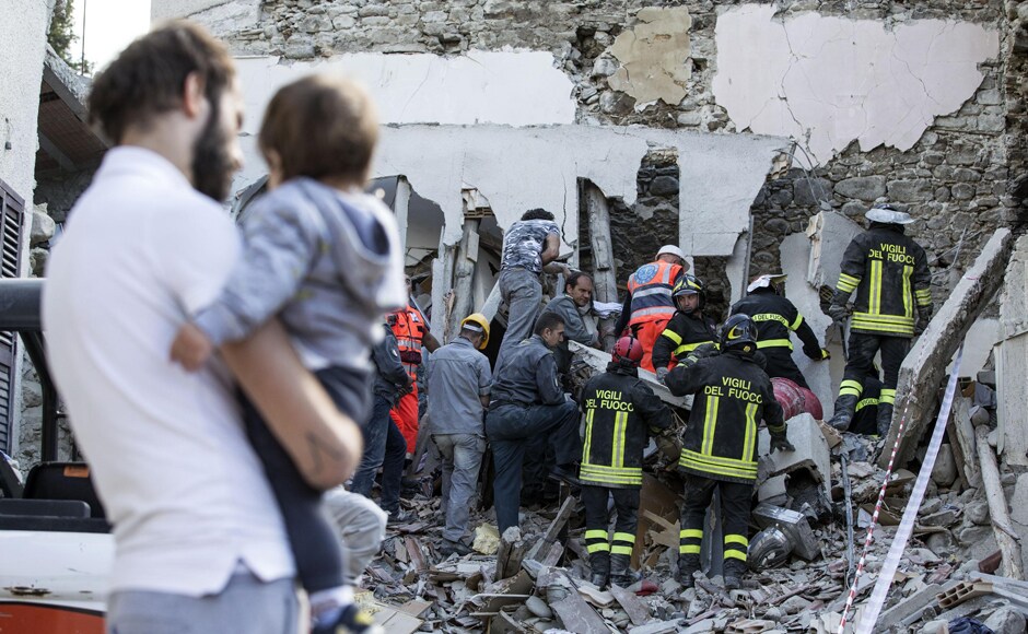Firefighters search amid rubble for survivors as the death toll rises to 247 following the earthquake in Accumoli. AP Firefighters search amid rubble for survivors as the death toll rises to 247 following the earthquake in Accumoli. AP