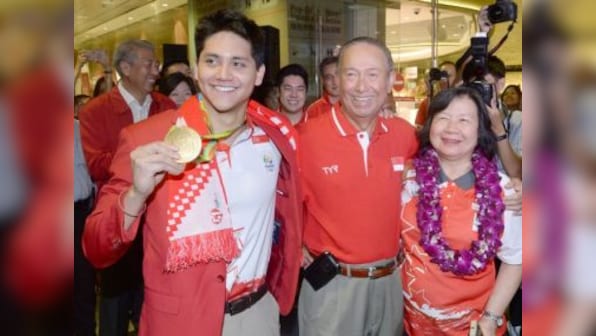 Rio Olympics 2016: Gold medalist Joseph Schooling returns to rapturous welcome in Singapore