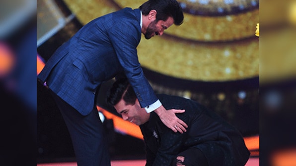 Karan Johar surprises Anil Kapoor by touching his feet on sets of Jhalak Dikhlaa Jaa