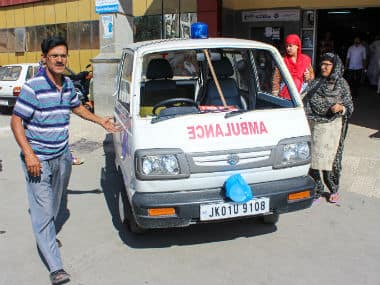 Mukhtar Ahmad was carrying an injured boy when he was attacked by paramilitary soldiers who smashed the front mirror of his ambulance. Sameer Yasir/Firstpost