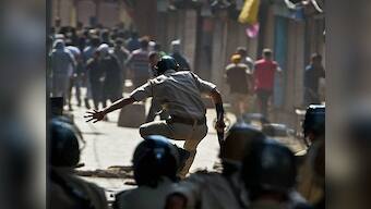 Kashmir continues to be in grip of violence after ATM guard is found filled with 300 pellets