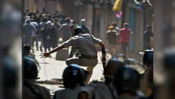 Kashmir continues to be in grip of violence after ATM guard is found filled with 300 pellets