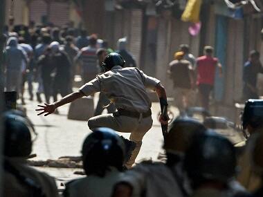 Kashmir continues to be in grip of violence after ATM guard is found filled with 300 pellets