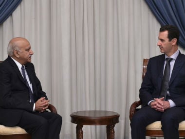 Minister of State for External Affairs MJ Akbar with Syrian President Bashar al-Assad. Twitter/@MEAIndia