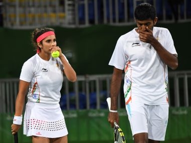 Sania Mirza-Rohan Bopanna celebrate their win in the quarterfinals. AFP