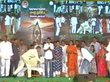 Watch: Andhra CM Naidu plays badminton with PV Sindhu on stage, takes drama to a new level Watch: Andhra CM Naidu plays badminton with PV Sindhu on stage, takes drama to a new level