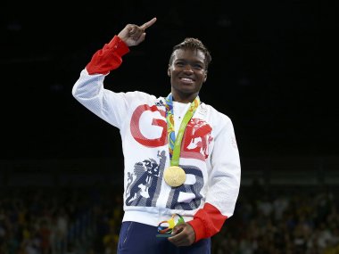 Gold medallist Nicola Adams of Britain poses with her medal. Reuters