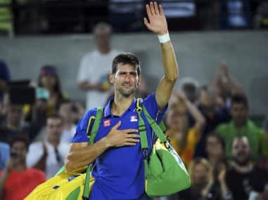 Novak Djokovico reacts after losing his match against Juan Martin del Potro. Reuters