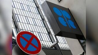 Crude oil prices fall over 1.5 percent on OPEC's deal to raise output, but markets to remain tight
