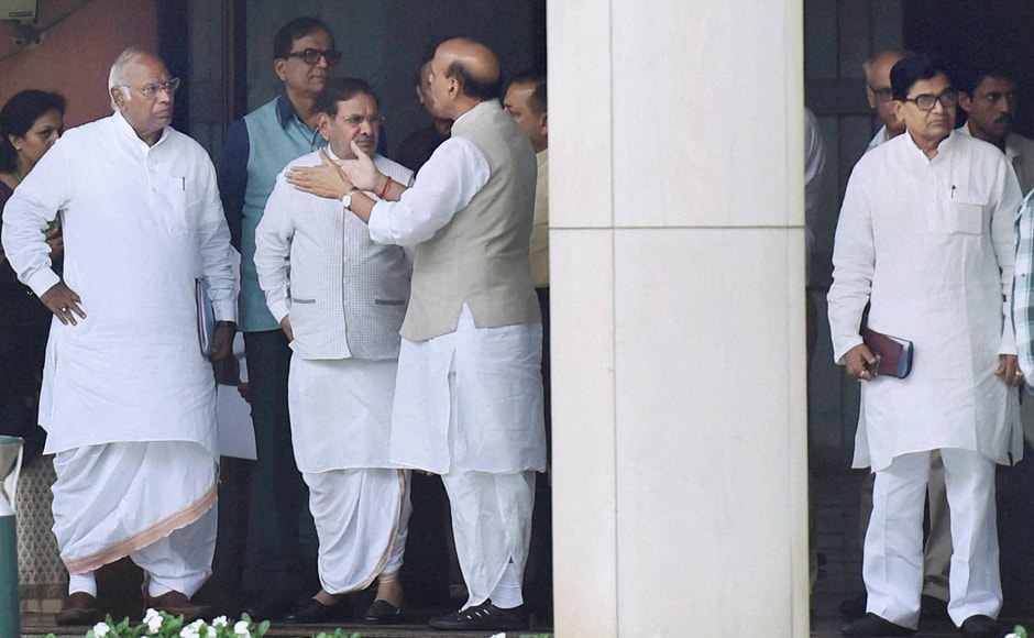 Home Minister Rajnath Singh (centre) and Mallikajun Kharge (left), Leader of Congress in Lok Sabha, at the all-party meet.