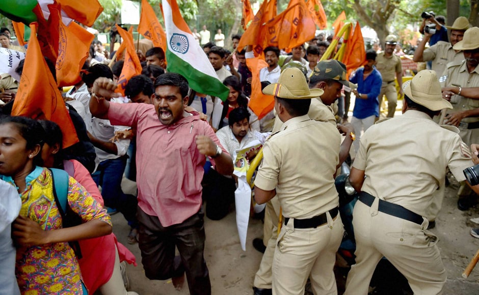 Bengaluru Police on Friday resorted to 'mild' lathi charge to disperse ABVP activists staging a protest in front of the Amnesty International India office here demanding an arrest of those who allegedly raised anti-India slogans at an Amnesty event. (Photo: PTI) Bengaluru Police on Friday resorted to 'mild' lathi charge to disperse ABVP activists staging a protest in front of the Amnesty International India office here demanding an arrest of those who allegedly raised anti-India slogans at an Amnesty event. (Photo: PTI)