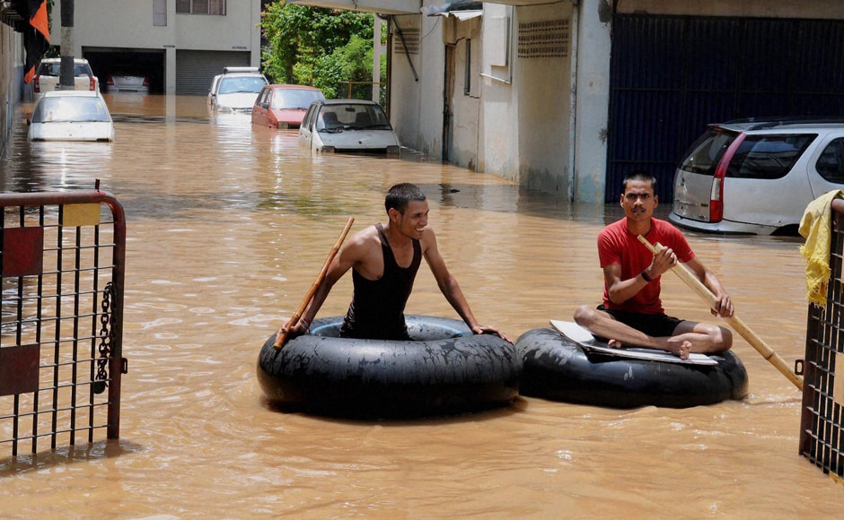 The flood in Ganga has rendered thousands of families homeless and aggravated the problems of the people in Bihar and Uttar Pradesh. Some of them have to use tube boats to commute. Photo: PTI The flood in Ganga has rendered thousands of families homeless and aggravated the problems of the people in Bihar and Uttar Pradesh. Some of them have to use tube boats to commute. Photo: PTI