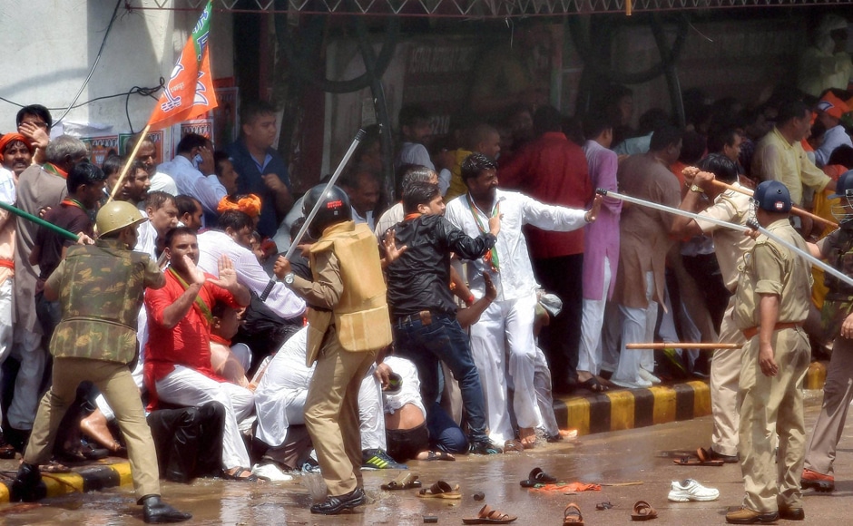 Some among the protestors pelted stones at police personnel, injuring a few of them, including Hazratganj Circle Officer Ashok Verma, and a media photographer. Photo: PTI Some among the protestors pelted stones at police personnel, injuring a few of them, including Hazratganj Circle Officer Ashok Verma, and a media photographer. Photo: PTI