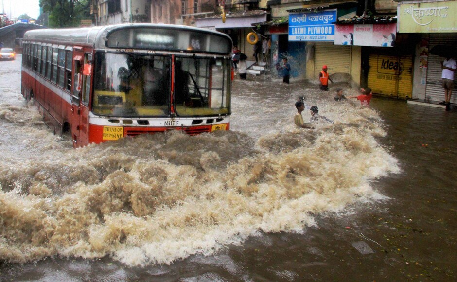 Heavy Rainfall Lashes Mumbai: Commuters Irked As Floods Stop Road, Rail ...