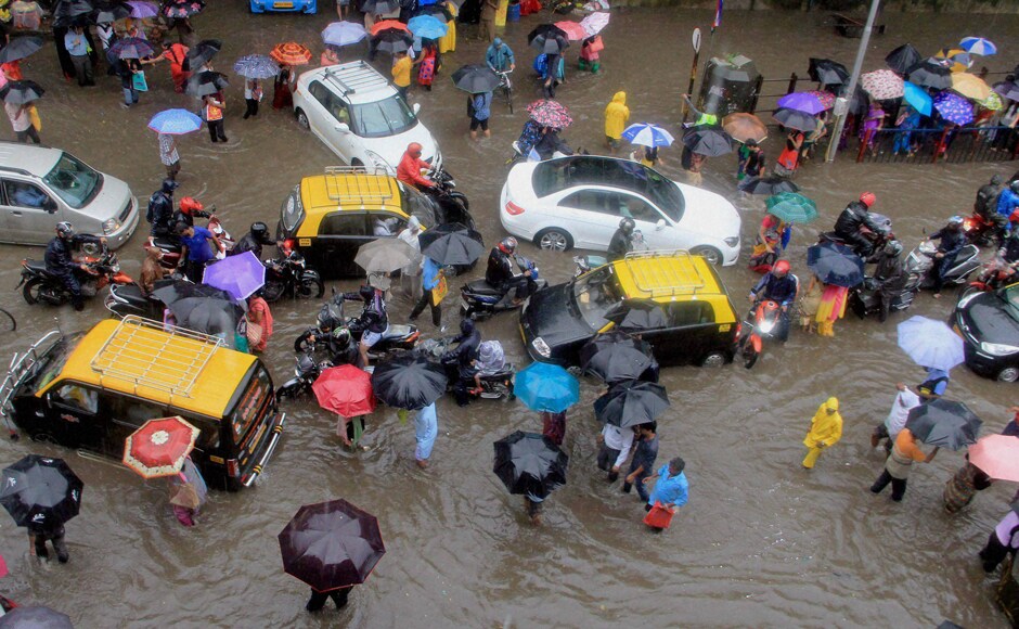 Traffic crawled at a snail's pace on major thoroughfares like Eastern Express and Western Express highways and major north-south roads, delaying tens of thousands of commuters. PTI Traffic crawled at a snail's pace on major thoroughfares like Eastern Express and Western Express highways and major north-south roads, delaying tens of thousands of commuters. PTI