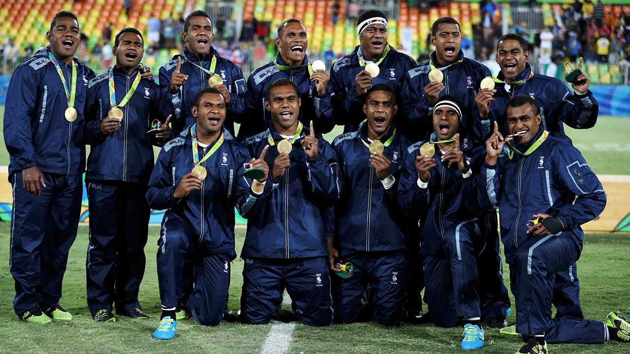 2016 Rio Olympics - Rugby - Men's Victory Ceremony - Deodoro Stadium - Rio de Janeiro, Brazil - 11/08/2016. Team Fiji pose for photos with their gold medals. REUTERS