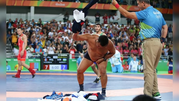 Rio Olympics 2016: Watch Mongolian coaches strip to underpants to protest wrestling result