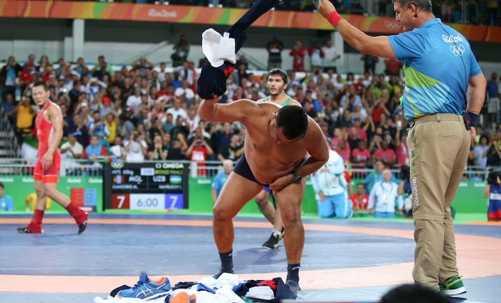 Rio Olympics 2016: Watch Mongolian coaches strip to underpants to protest wrestling result