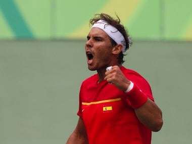 Rafael Nadal celebrates defeating Gilles Simon at the 2016 Rio Olympics. AP