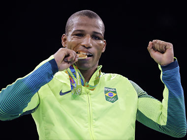 Rio Olympics 2016: Vegetable seller becomes national hero after winning ...
