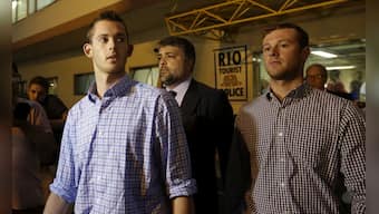 Rio Olympics 2016: US authorities apologise as swimmers leave Brazil after admitting to inventing 'mugging'