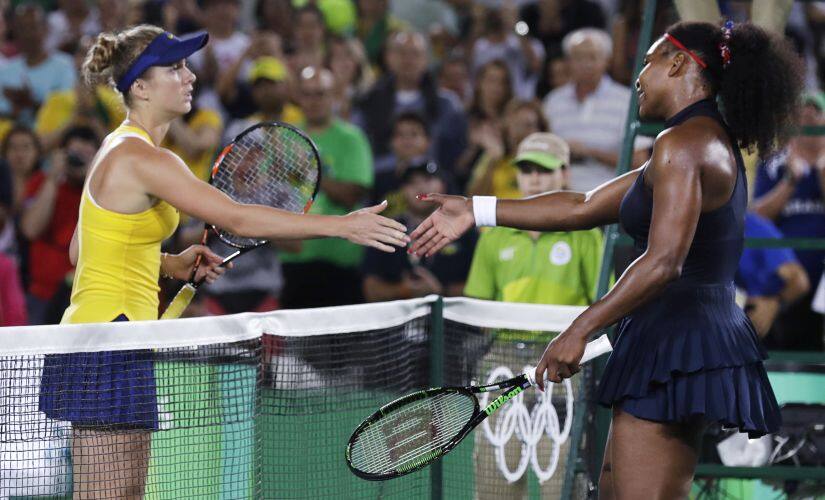 Serena Williams shakes hands with Elina Svitolina after loss. AP