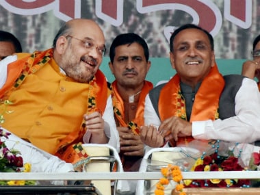 A file image of BJP president Amit Shah and Vijay Rupani. PTI