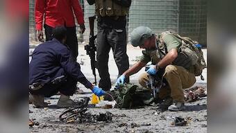 Twin car bombings in Somalia kill 10