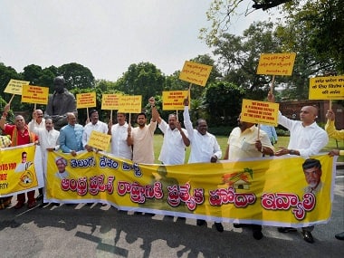 New Delhi: TDP members protest demanding special status for Andhra Pradesh at Parliament House during the ongoing monsoon session in New Delhi on Tuesday. PTI Photo by Shahbaz Khan (PTI8_2_2016_000107B)