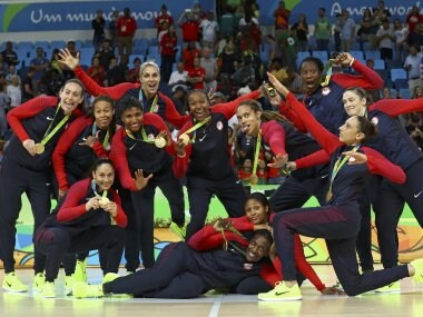 Team USA pose with their gold medals. Reuters