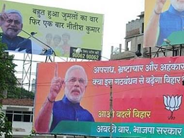 A file image of ads campaign posters of BJP and JD(U) during the Lok Sabha elections 2014. Tarique Anwar