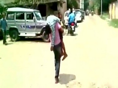 Kanpur tragedy: Ailing son dies on father's shoulders after being denied entry into three hospitals Kanpur tragedy: Ailing son dies on father's shoulders after being denied entry into three hospitals