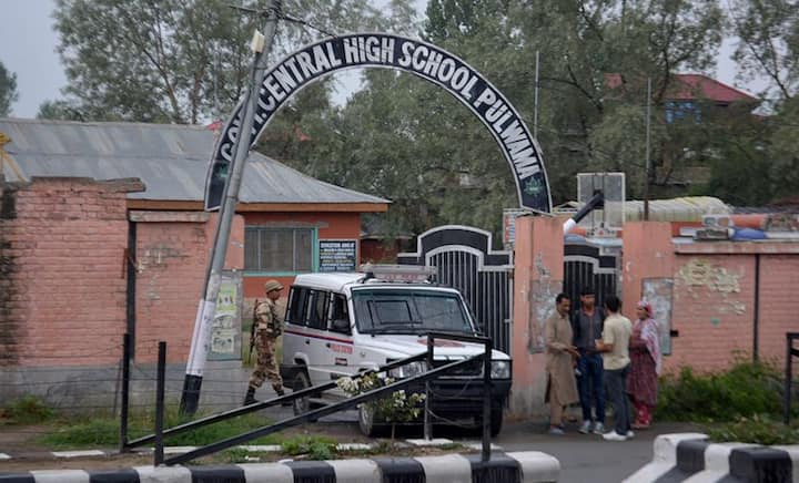 Schools in Kashmir turn into armed fortresses as students watch in muted horror
