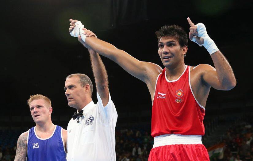Manoj Kumar celebrates after winning his bout against Evaldas Petrauskas. Reuters 