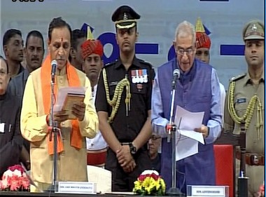Vijay Rupani sworn-in as the 16th chief minister of Gujarat; Nitin Patel Deputy CM Vijay Rupani sworn-in as the 16th chief minister of Gujarat; Nitin Patel Deputy CM