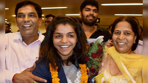 Loud cheers, govt jobs, badminton game: Here's how India welcomed Rio 2016 stars Sindhu, Sakshi and Dipa