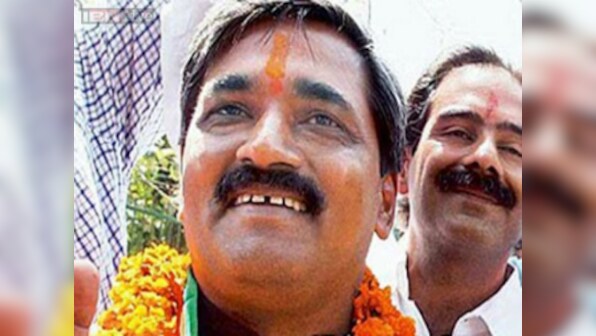 BJP Delhi unit holds demonstration over suppression of CAG report on advertisements by AAP