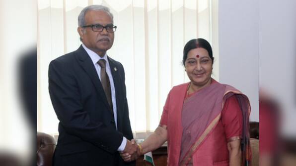 Maldivian Foreign Minister Mohamed Asim meets Sushma Swaraj on his first official visit abroad