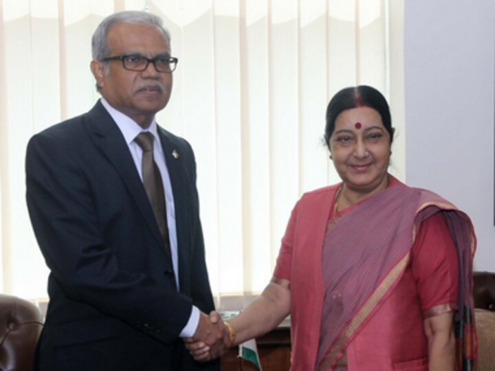 Maldivian Foreign Minister Mohamed Asim meets Sushma Swaraj on his first official visit abroad