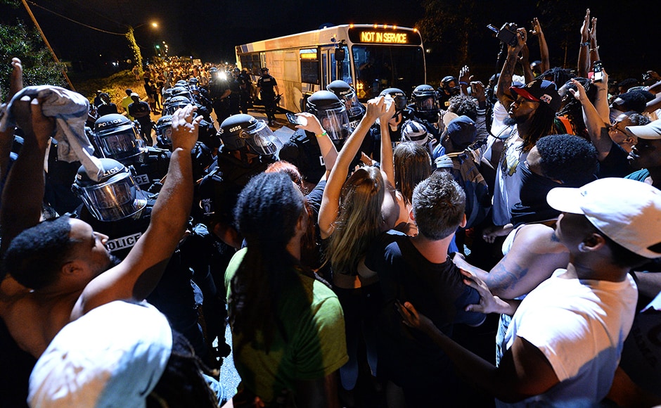 Early Wednesday morning, protesters blocked Interstate 85, where they stole boxes from trucks and started fires before police used flash grenades in an attempt to disperse the angry crowd, an ABC affiliate in Charlotte reported. AP Early Wednesday morning, protesters blocked Interstate 85, where they stole boxes from trucks and started fires before police used flash grenades in an attempt to disperse the angry crowd, an ABC affiliate in Charlotte reported. AP