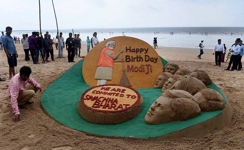 Sand artist Sudarsan Pattnaik creates a sand sculpture in Mumbai wishing PM Modi on his birthday. PM Modi, who was born on 17 September, 1950 in Vadnagar area of Gujarat, began his day by meeting his 97-year-old mother in Gandhinagar. PTI Sand artist Sudarsan Pattnaik creates a sand sculpture in Mumbai wishing PM Modi on his birthday. PM Modi, who was born on 17 September, 1950 in Vadnagar area of Gujarat, began his day by meeting his 97-year-old mother in Gandhinagar. PTI